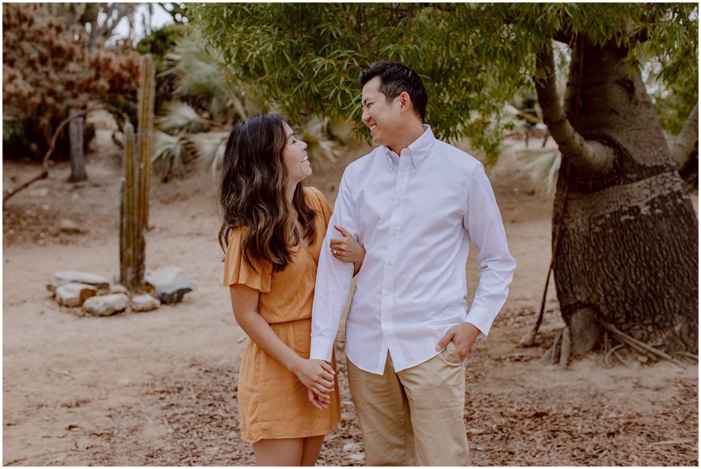 couple poses for san diego engagement photos